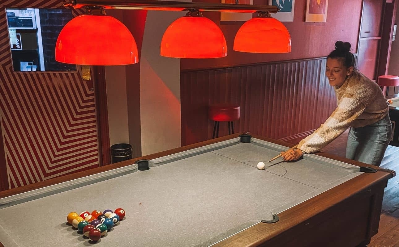 Play pool at the Hideout