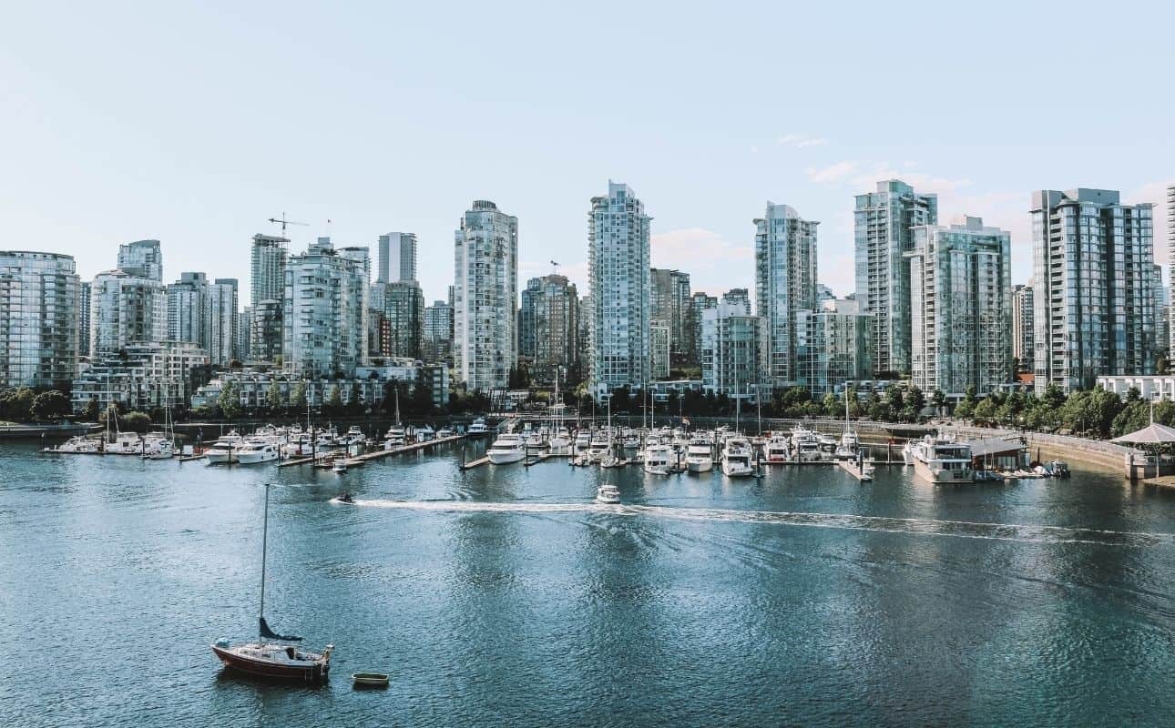 Kayak at sunset in False Creek, one of the romantic things to do in Vancouver for active couples