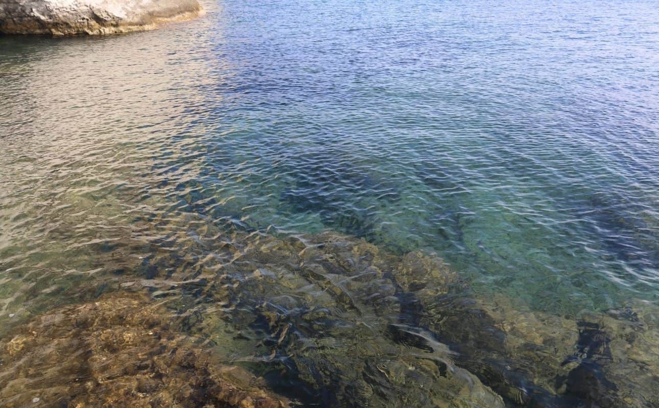 Walk on Klima beach Milos with your partner