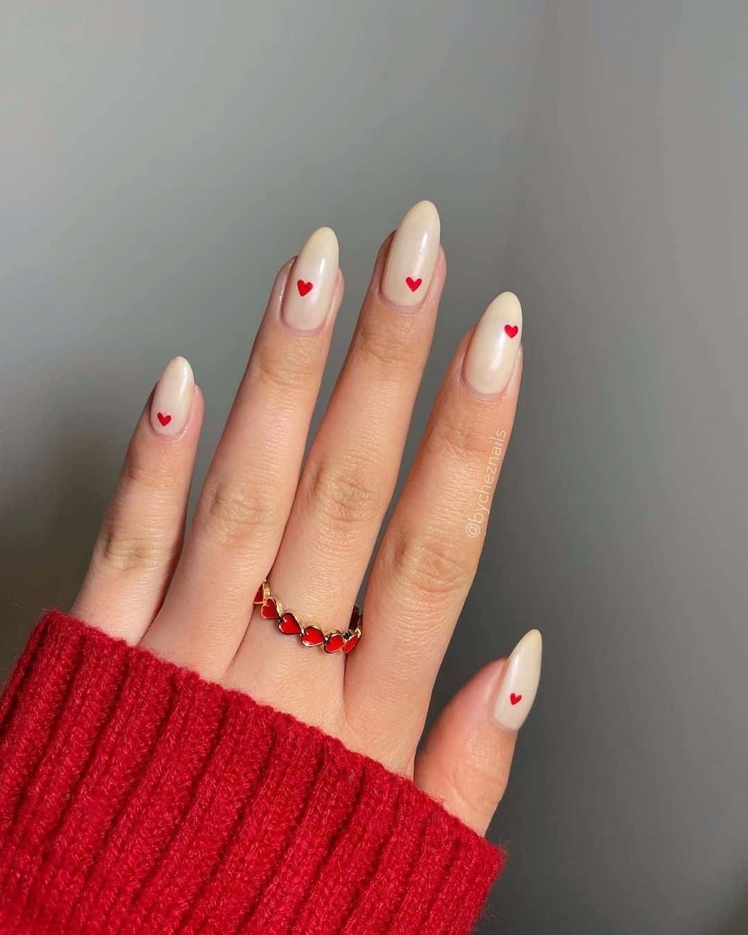 Red Hearts on Cream Nails