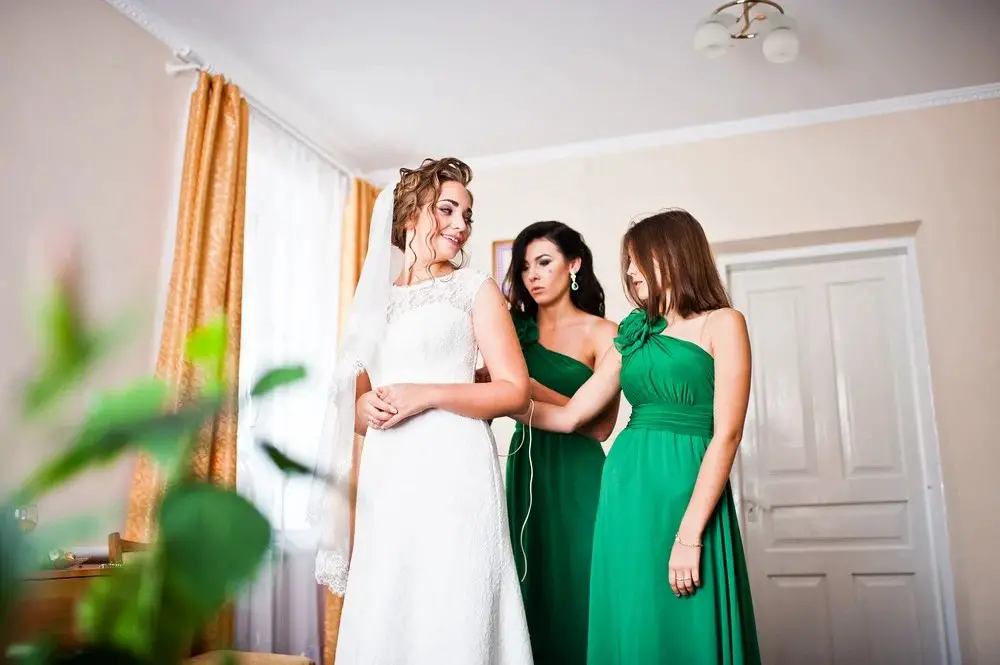 The Bride Putting on Her Dress