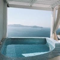 Comparison table of the best hotels in Fira Santorini Greece